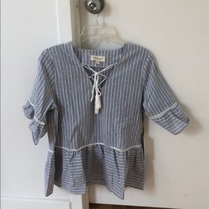 Coverstitched size M striped top